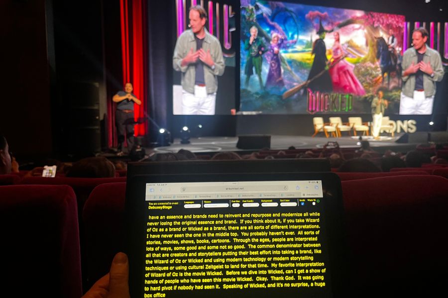 Tablet displaying live TypeWell captions during a theater presentation