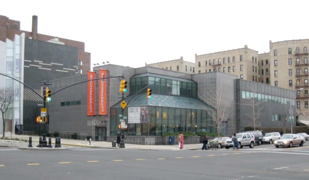 The angular glass and steel frontage of the Bronx Museum of the Arts on the Grand Concourse.