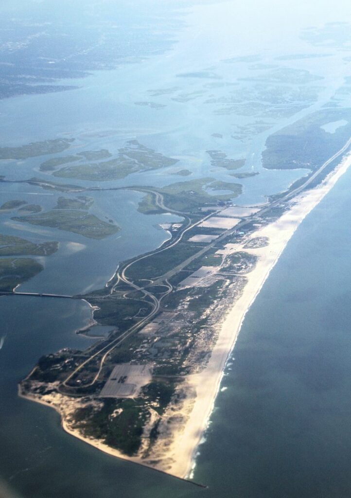 An aerial view of the barrier beach, parkway, and marsh islands at Jones Beach State Park on Long Island's South Shore.