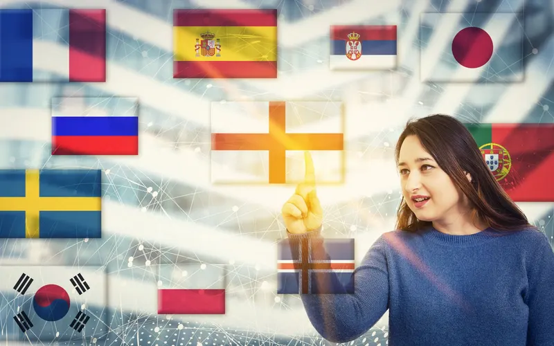 A woman selecting international flags on a multilingual touchscreen interface